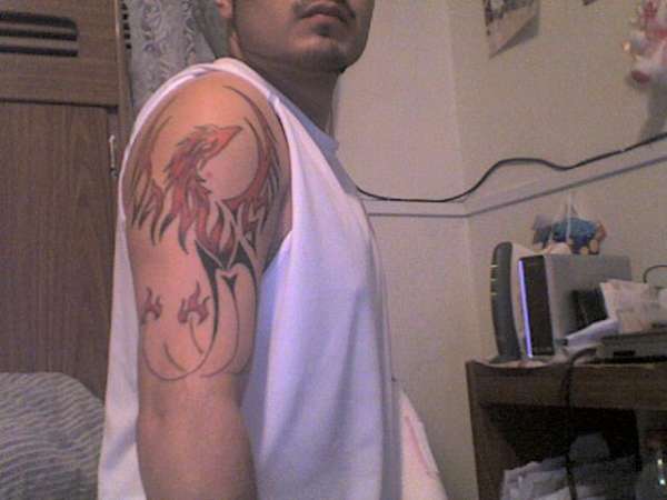 phoenix bird with daughters name tattoo