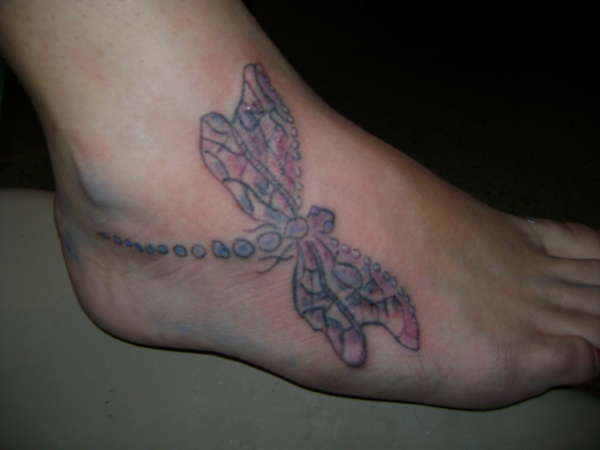 Dragon fly on daughter tattoo