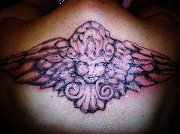 Angel crap tattoo