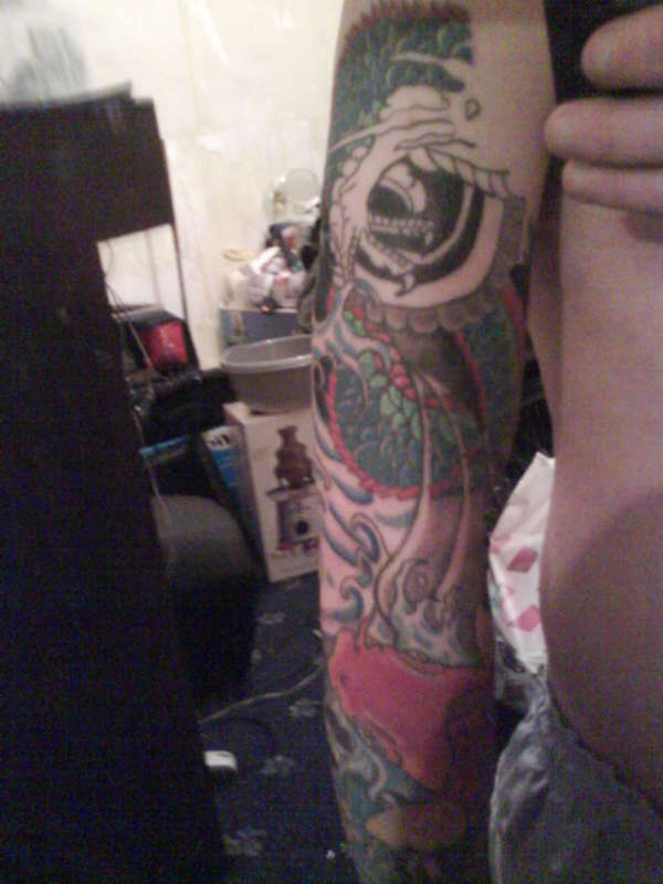 Left arm Sleeve tattoo
