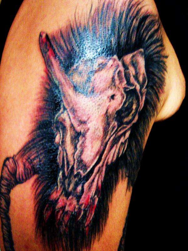 Skull crap tattoo