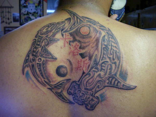 biomechanical dolphin and hammerhead tattoo