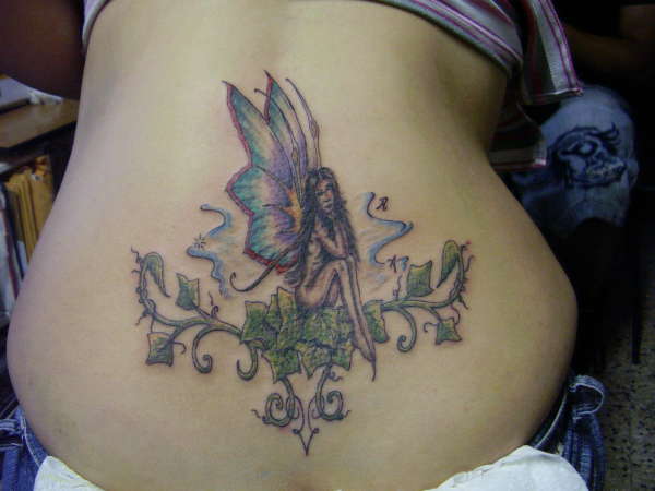 fairie with flowers tattoo