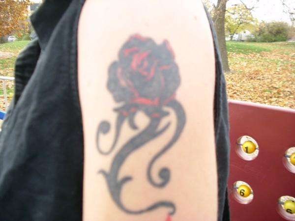 Joc's tat tattoo