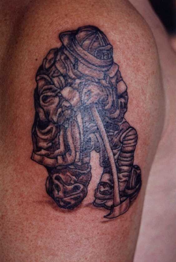 praying firefighter tattoo