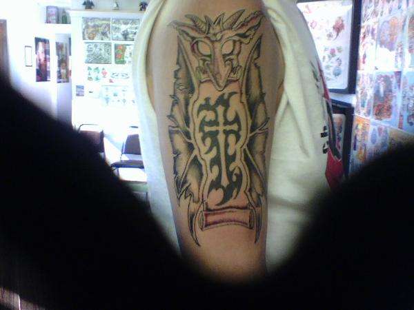 Gargoyle, right arm tattoo