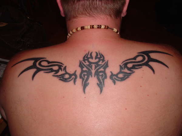 Tribal Wings tattoo