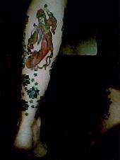 left leg tattoo