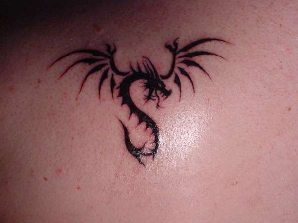 Small Tribal Dragon tattoo