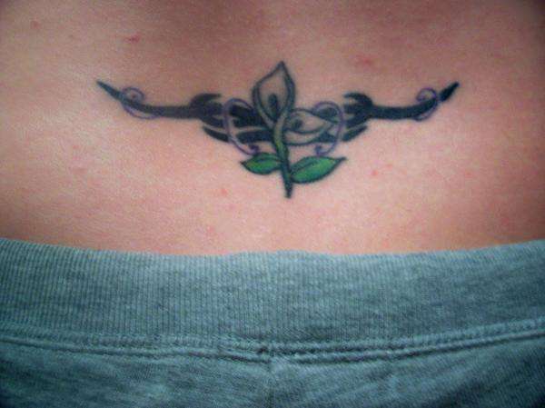 Calla lilies with tribal art tattoo