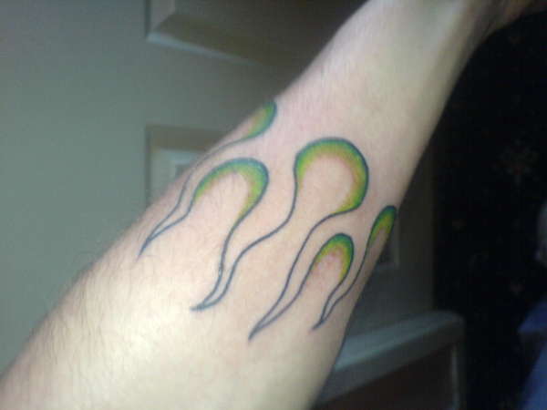 flames w/green fade tattoo