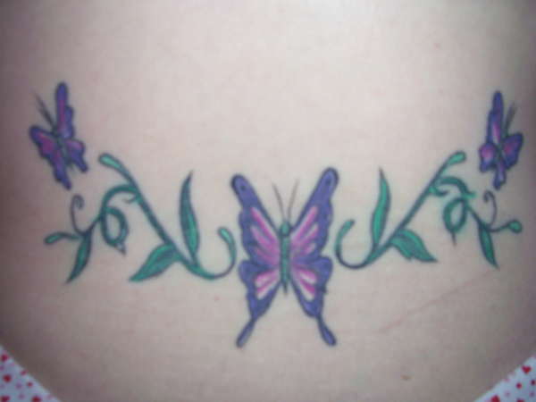 Butterflies and vines tattoo