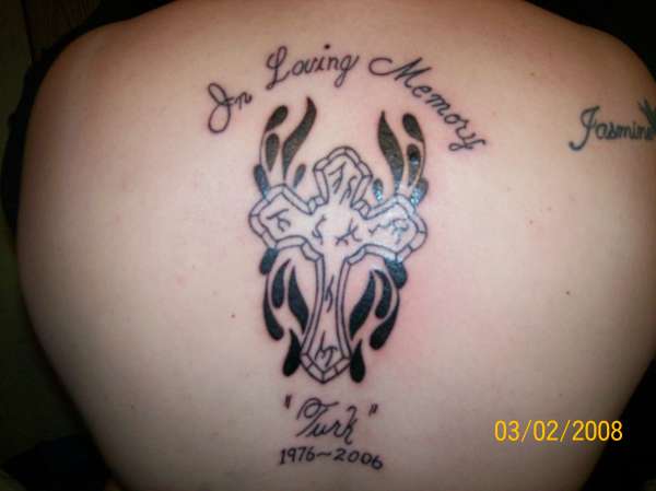 "In Memory Of" tattoo