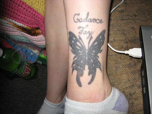 butterfly with oldests daughters name tattoo