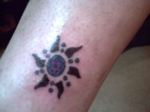Tribal star tattoo
