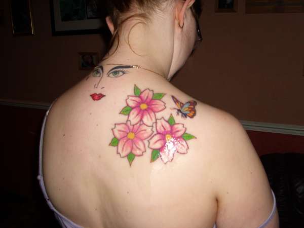 Butterfly and cherry blossoms tattoo