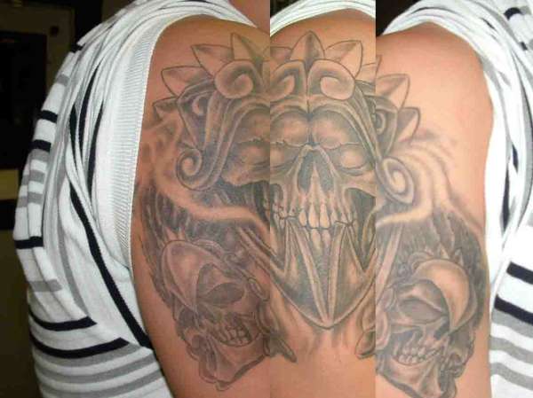 Aztec styled skulls tattoo