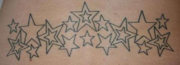 Stars on lower back tattoo