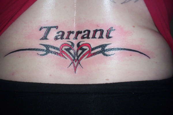 lower back last name tattoo
