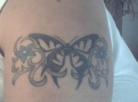 Rens tribal b-fly tattoo
