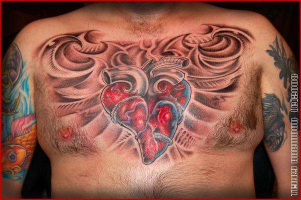 Bio-Mech Heart Chest Piece tattoo