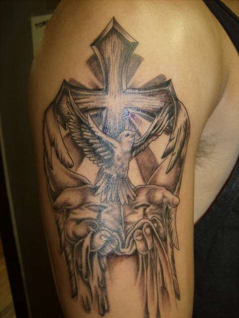 cross and dove tattoo