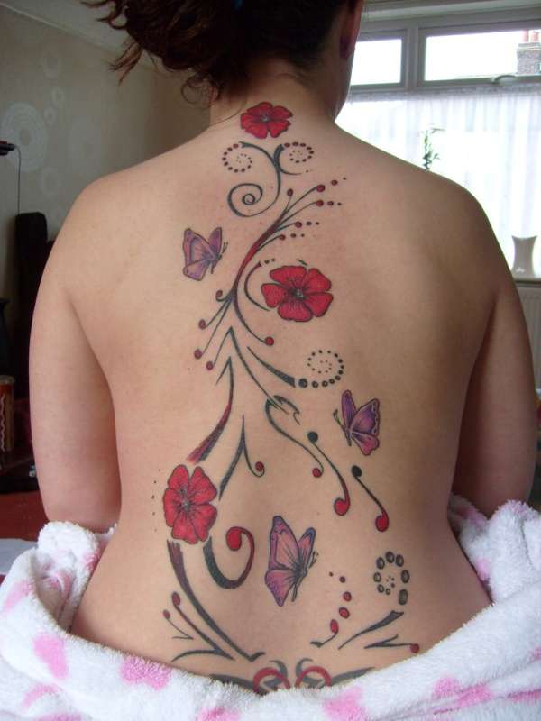 Flowers and butterflies tattoo