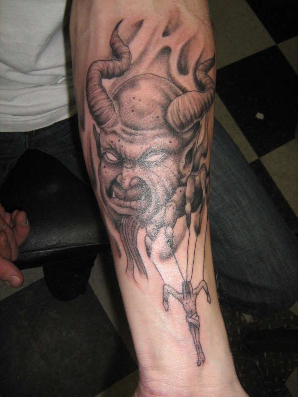 Satans puppet tattoo