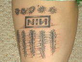 NIN tattoo