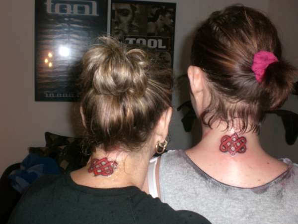Mother daughter matching eternal love symbols tattoo