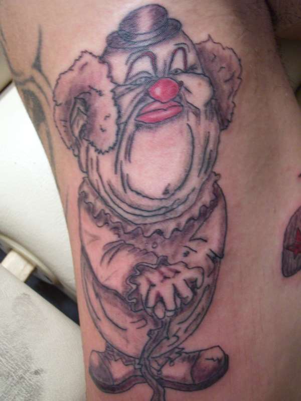 clown by justice tattoo