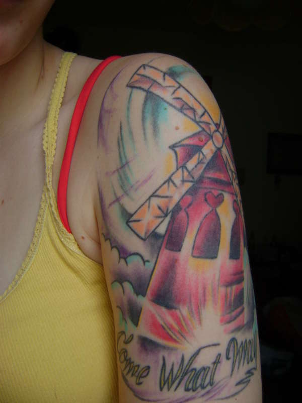 Moulin Rouge windmill tattoo