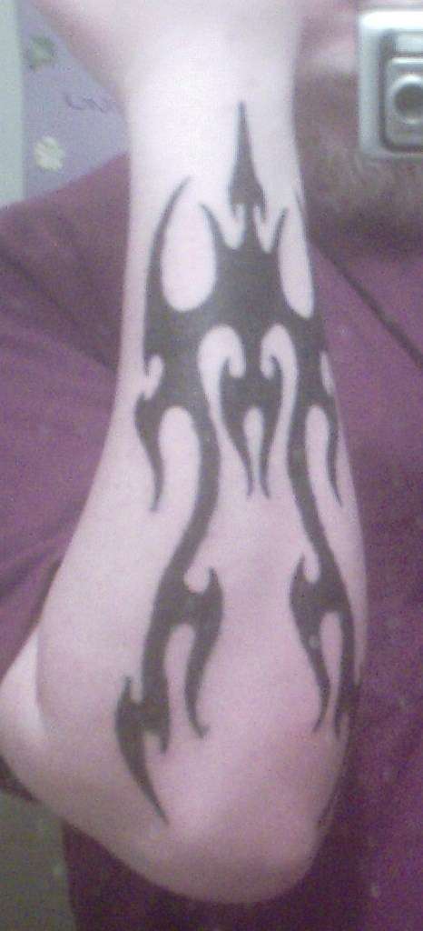 forearm agian tattoo
