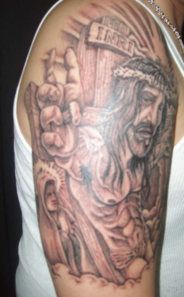 jesus tattoo half sleeve
