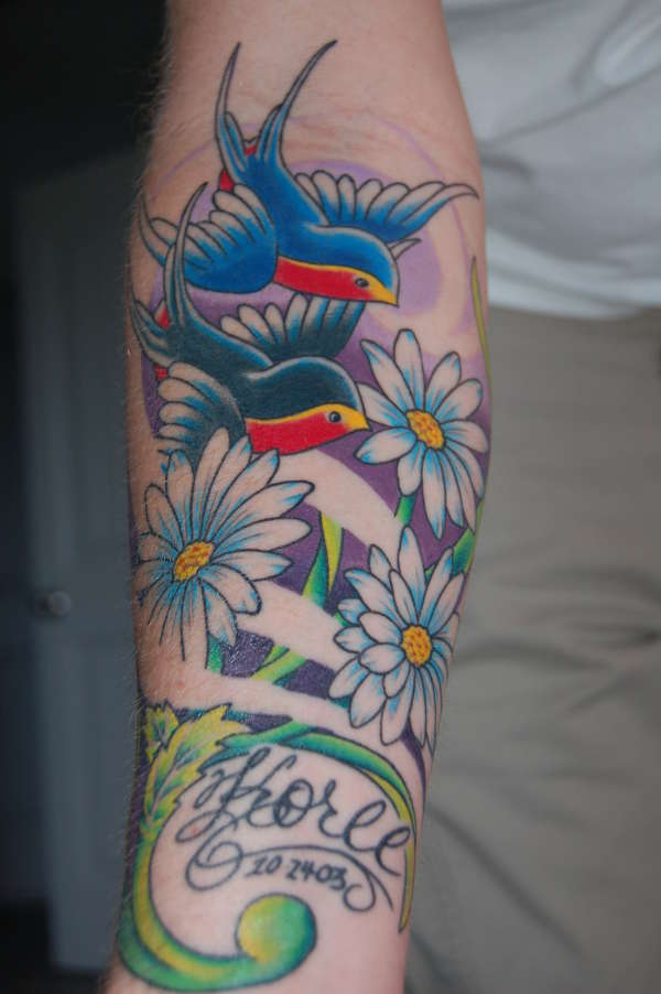 swallows and daisies tattoo