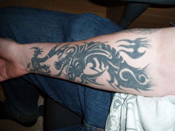 got this one when i was 14 ha tattoo
