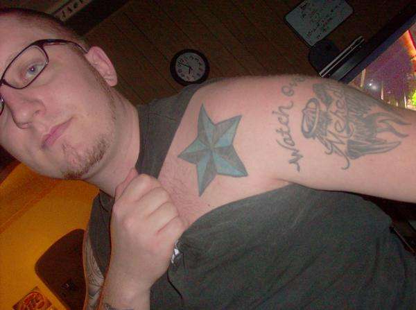 Left Arm tattoo