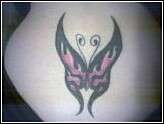 flame tribal butterfly tattoo