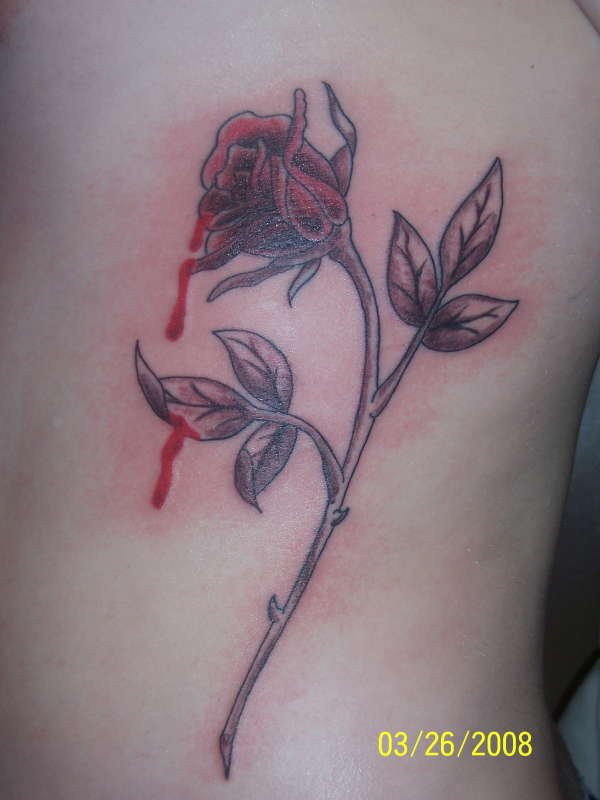 Bleeding Rose tattoo.