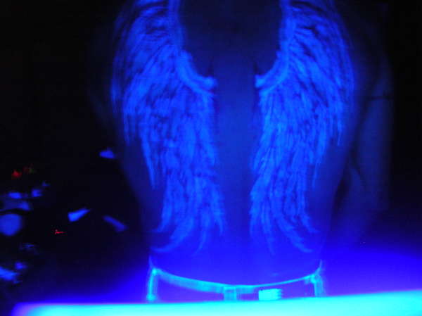 wings (black light) tattoo