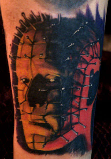 Pin head tattoo