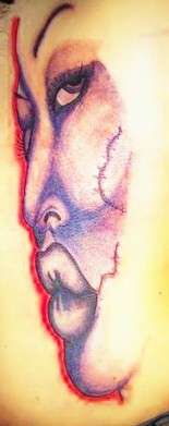 rib tat tattoo