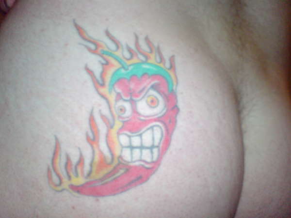 chili pepper on bum cheek tattoo