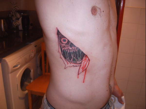 creepy man. and a tattoo. tattoo