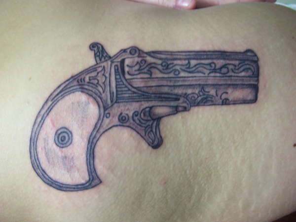 My wifes gun tattoo