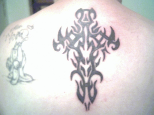 tribal cross tattoo