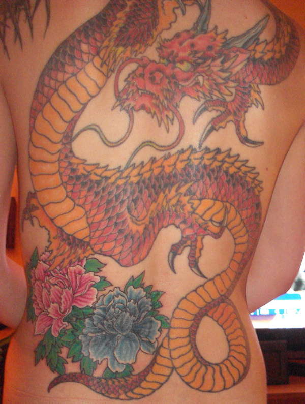dragon back piece with peonies tattoo