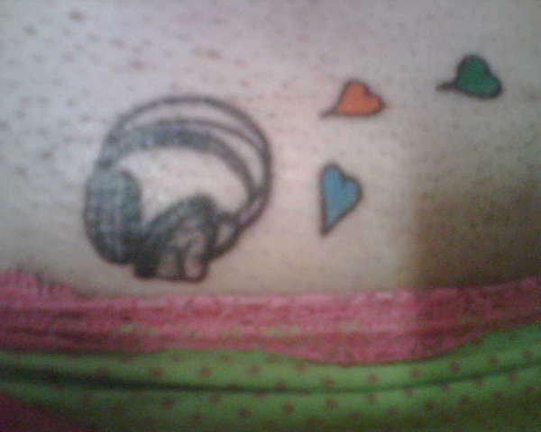 Headphones with hearts tattoo