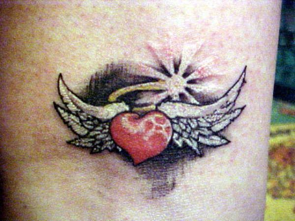heart w/wings tattoo