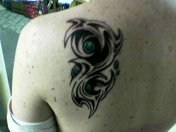 My tribal tattoo on the back tattoo